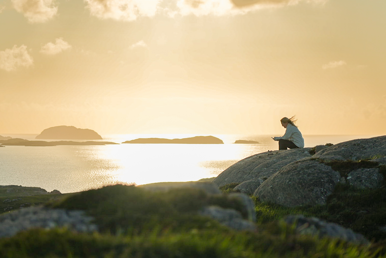 Gry i solnedgangen på Yte Hebridene, foto